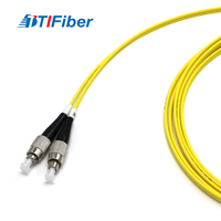 Kabel Patch Komunikasi Singlemode Duplex 15m dengan Jaket PVC LSZH, UPC ST, dan UPC FC