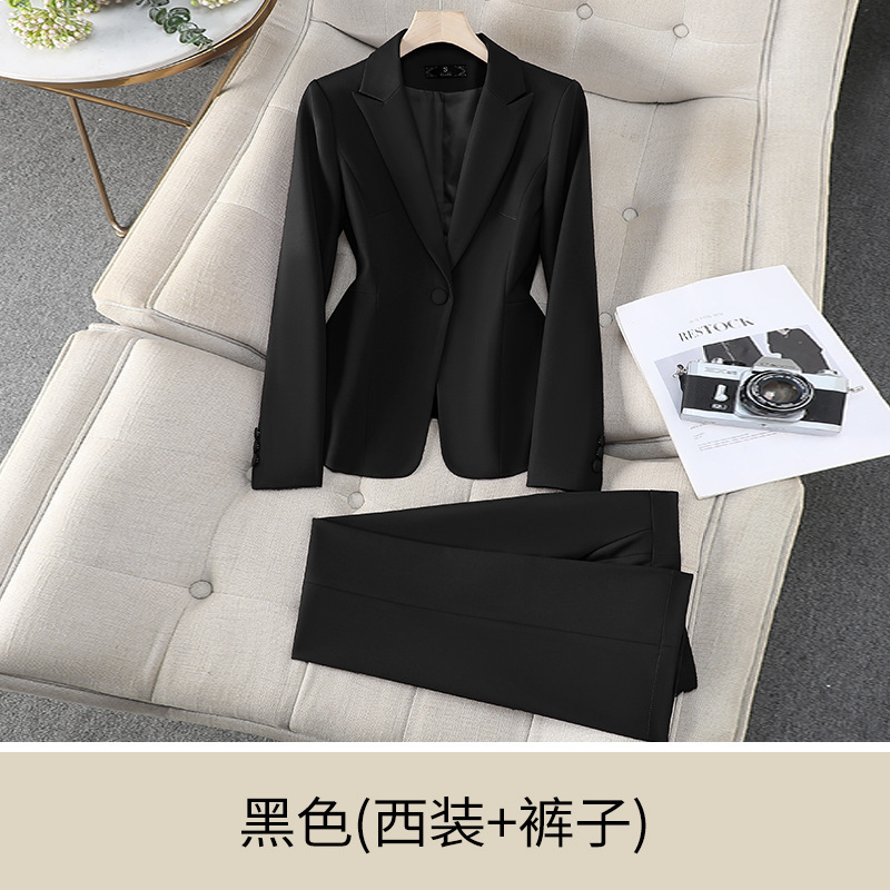 Black suit with slightly flared trousers