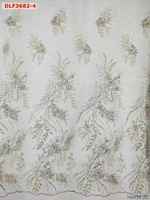 Tissus de mariée en polyester 100% à prix d'usine étincelants nouvelle broderie perlée lourde avec tissu de robe en maille durable à paillettes