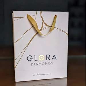 Proveedor de bolsas de papel de compras Bolsos de gama alta Bolsas de regalo de ropa con estampado de flores-Bolsas de recuerdo Premium al por mayor - Product Image 3