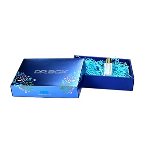 Boîte cadeau pour soins de la peau avec logo personnalisé, couvercle et base bleus, emballage <span class=keywords><strong>en</strong></span> carton rigide avec rembourrage <span class=keywords><strong>en</strong></span> papier déchiqueté - Product Image 2