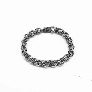 Pulsera de acero y titanio con diseño de esqueleto y elemento de cruz con patrón geométrico para hombre, accesorio de moda y joyería. - Product Image 1