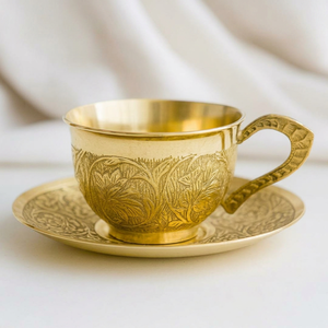 Brass <b>Cup</b> and <b>Saucer</b> with Etched Floral Patterns and Glossy Finish for Elegant Beverage Service - Product Image 1