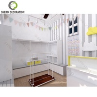 Vitrine populaire vitrine en bois magasin de vêtements présentoir pour magasin de vêtements pour magasin de vêtements pour bébé