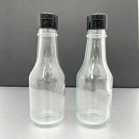 Bouteille en verre transparente de qualité alimentaire de 150 ml avec couvercle à clapet en plastique pour confiture, vinaigrette, ketchup, sauce chili