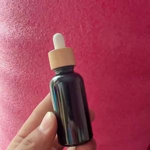 Vente Flash : Flacon compte-gouttes en verre vide pour sérum liquide, noir mat, 5ml, 10ml, 15ml, 30ml, 50ml, 100ml, avec impression sérigraphique et logo personnalisé - Product Image 2