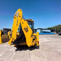 Chargeuse-pelleteuse d'occasion JCB 3CX originale du Royaume-Uni, populaire pour les travaux de terrassement et la réparation routière