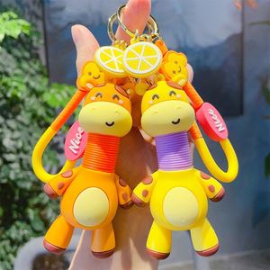 Wholesale Animal Keychain Cartoon Cute Giraffe Keychain 3D PVC Keyring Funny Stretchy Tube Giraffe Toy <b>Key</b> <b>Chain</b> for Kids Gift - Product Image 1