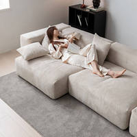 Canapé modulaire minimaliste italien en velours côtelé, style crème, avec éléments en tissu imitation tofu, déhoussable et lavable