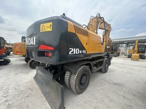 รถขุดล้อยางมือสอง รุ่น 210W รถขุดไฮดรอลิก อุปกรณ์ก่อสร้างงานดิน - Product Image 3