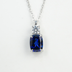 925 Sterling Silver <b>Pendant</b> Necklace, <b>Emerald</b> Cut Lab Created Sapphire with Round CZ Accent Fine Jewelry for Women - Product Image 1
