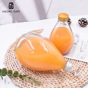 OEM <span class=keywords><strong>250</strong></span> <span class=keywords><strong>ml</strong></span> 500 <span class=keywords><strong>ml</strong></span> trasparente vuoto rotondo <span class=keywords><strong>latte</strong></span> bevande succo spremuto a freddo bevanda bottiglia di vetro con coperchio in plastica - Product Image 1