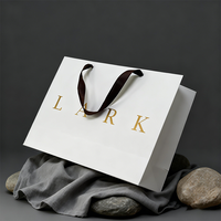 Sacs cadeaux de luxe personnalisés écologiques avec poignées en ruban, emballage en papier rose pour vêtements