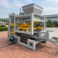 Machine à blocs creux hydraulique entièrement automatique QT4-15 de haute qualité et à production élevée, ligne de moulage de briques en béton et en ciment