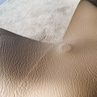 Amplop Kulit Hitam dengan Dekorasi Manik-manik Bunga Pita yang Elegan