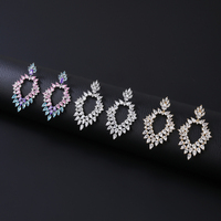 Nouvelles boucles d'oreilles pendantes en cristal de zircone cubique brillant, style brésilien, forme de plante, longues, dorées, tendance, pour dîner féminin