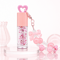 Fournisseur fiable de porte-clés cœur, gloss à lèvres OEM, marque privée, qualité stable, brillance succulente, breloque décorative, vente en gros