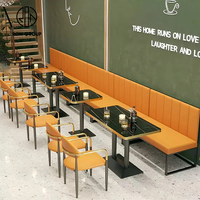 Ensemble de table et banquette de café commercial au design moderne, respectueux de l'environnement, en marbre, cuir et fer, pour restaurant