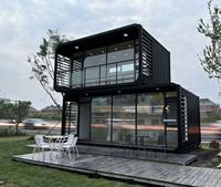 Maison capsule moderne préfabriquée en acier de luxe à double paroi pour usage professionnel et vacances, alimentée à l'énergie solaire, 2-3 chambres