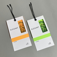 Étiquette en silicone avec logo 3D couleur noir intégral, nouvelle conception d'étiquette en caoutchouc PVC avec logo convexe et chaîne à billes noire