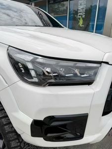 Phares LED modifiés et améliorés <span class=keywords><strong>TK</strong></span> Factory Price pour Toyota Hilux Revo Rocco 21-24 à 3 lentilles - Product Image 5