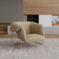 Canapé simple de style moderne pour salon, fauteuil de relaxation en laine d'agneau capitonné avec base pivotante en acier inoxydable pour usage hôtelier