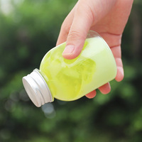 Mini bouteille de jus de tir clair 60ml 2OZ bouteille de jus en plastique PET avec bouchon inviolable bouteille de jus pressée à froid