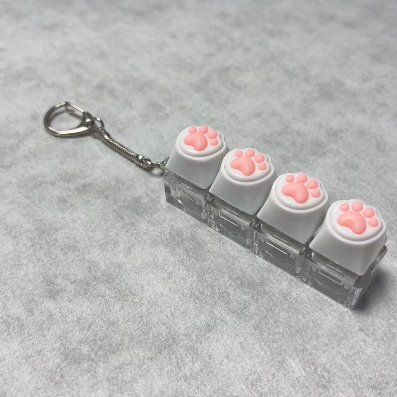 Coque transparente à quatre boutons - patte de chat blanche en silicone