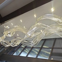 Lustre moderne en forme de grand ruban de soie pour salon, hall d'hôtel, salle de banquet, projet personnalisé