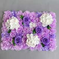 Décorations florales, toile de fond florale pour mariage avec plusieurs couleurs de roses artificielles et fleurs colorées au sol.