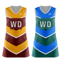 Individuell Bedruckte Sublimations-Netballkleider in Gelb Großhandel Schnelltrocknender Stoff Blanko Damen-Netballuniform-Kleider