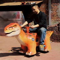 Machine à chevaucher dinosaure carnivore électrique, attraction récréative extérieure pour sites thématiques et destinations touristiques