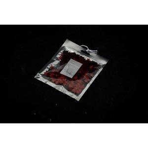 CONJUNTO DE CONFETIS METÁLICOS ROJOS EN FORMA DE ESTRELLA DE 20 GRAMOS - Product Image 1