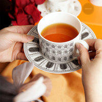 Tasse à café Sole de style italien Ensemble tasse à thé et soucoupe en céramique avec bord doré et boîte cadeau
