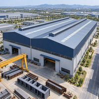 Bâtiment d'atelier préfabriqué à double travée en structure métallique lourde avec système de pont roulant