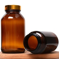 Bouteille en verre scellée à capsule brune bouteille à large bouche pour la distribution de comprimés poudre 100ml 250ml 500ml bouteille brune résistante à la lumière