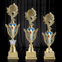 Piala Kompetisi Plastik untuk Lomba Puisi, Lomba Matematika, Lomba Lukis, dan Piala Kenangan Anak-Anak