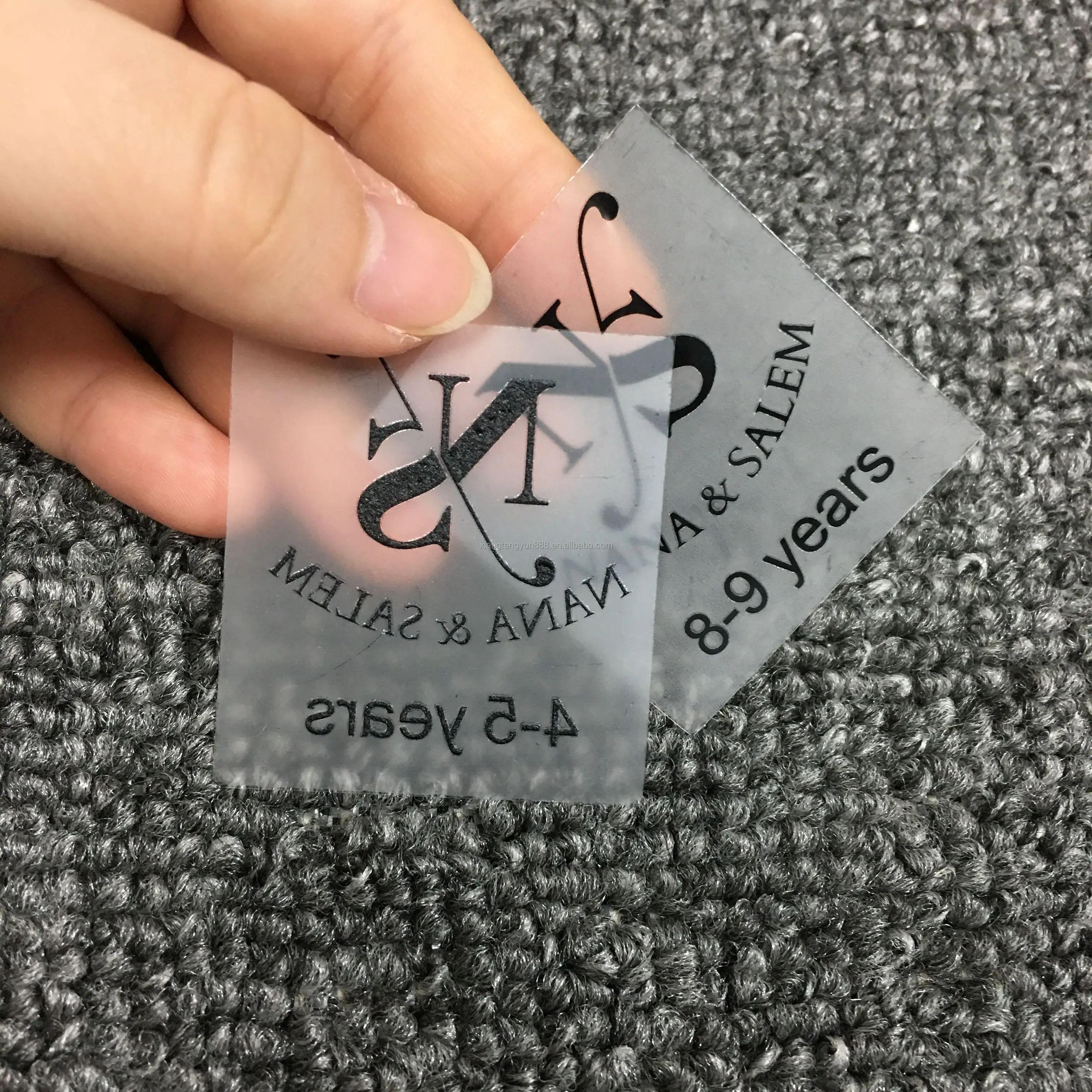 タグレスラベルに印刷されたロゴ透明衣類アイロン、卸売熱伝達高級ウォッシャブルケアラベル