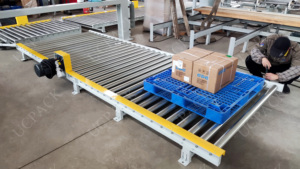 Transportador de rodillos de paleta motorizado de plato giratorio de transferencia automática UCPACK - Product Image 6