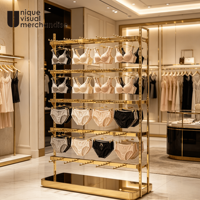 Présentoir à lingerie mural en or personnalisé avec étagère pour soutiens-gorge et sous-vêtements pour la décoration et le design de magasin