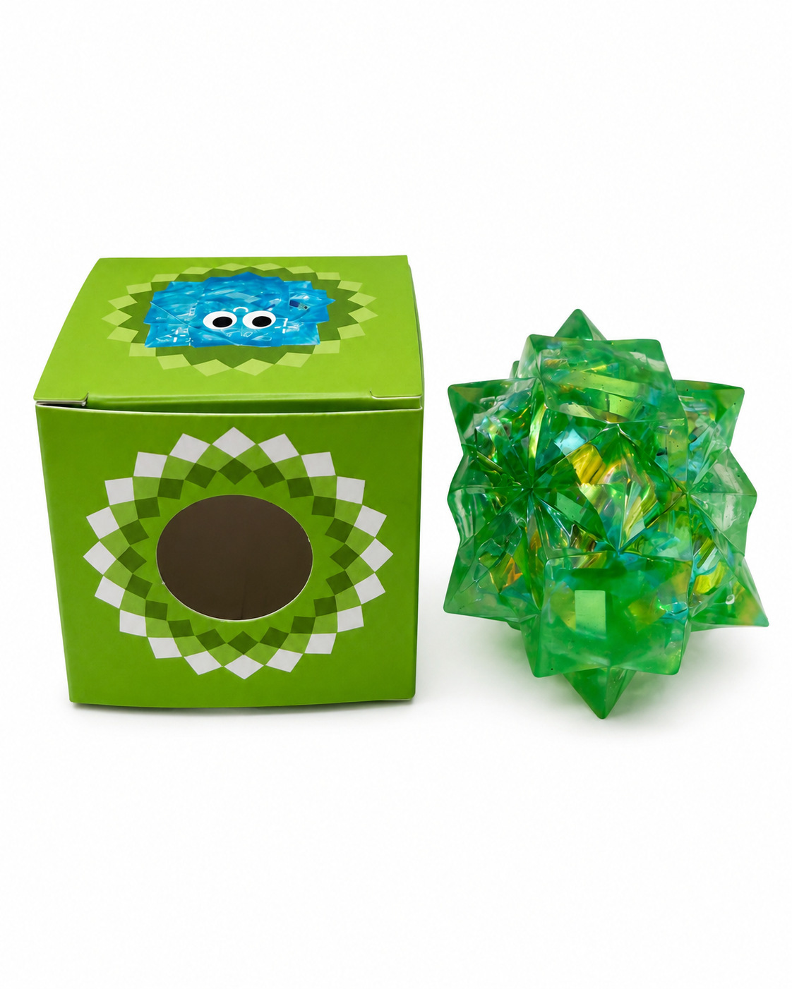 Boule verte de forme irrégulière dans une boîte