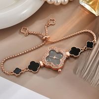 Montres pour femmes lumière luxe diamant incrusté pour trèfle montre quatre feuilles dames mode Quartz Bracelet montre-bracelet