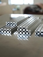 Profilés en aluminium extrudé conformes aux normes européennes, spécifications multiples à rainures en T, 6063 anodisé, pièces modulaires pour le cadre de machines