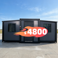 Cabine de vie préfabriquée modulaire portable en acier sur mesure, conteneur noir de 20 pieds, maison de conteneur extensible