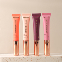 Tête de brosse floquée pour rouge à lèvres cosmétiques avec logo personnalisé Tubes de brillant à lèvres orange vides avec applicateur de flocage