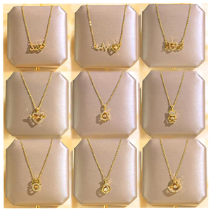 Collier délicat en acier inoxydable plaqué or 18 carats avec pendentif en forme de cœur <span class=keywords><strong>ECG</strong></span> et lettre, hypoallergénique, avec des ailes, pour femmes, cadeau - Product Image 1