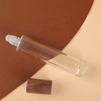 Bouteilles à rouleaux d'huile essentielle en verre transparent 10ml 15ml Bouteilles à rouleaux pour huiles essentielles avec bouchon en bois