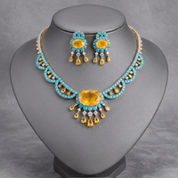 Parure de bijoux Bohème en laiton plaqué or avec collier à franges et boucles d'oreilles pendantes, ornée de citrine jaune, zircone et cristal turquoise, pour soirée