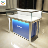 Présentoir de lunettes de soleil et de montres personnalisé au design moderne pour magasin de détail Prix d'usine Fabriqué en verre trempé et aluminium