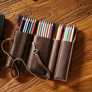 Vintage couche supérieure peau de vache stylo rideau en cuir véritable stockage stylo sac à la main multi-fonction roulé stylos étui